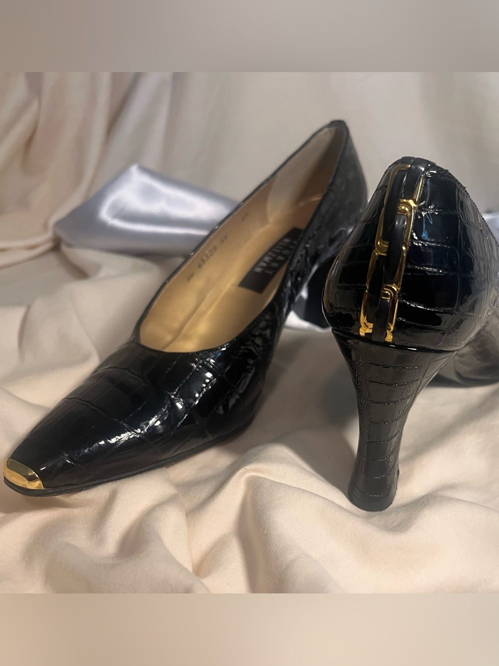 Stuart Weitzman Black Croc-Embossed Pointed Toe Pumps with Gold Hardware